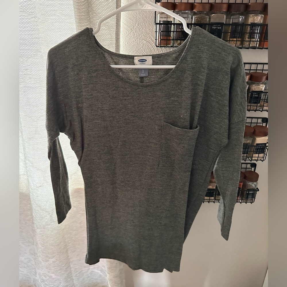 Olive green quarter sleeve shirt.